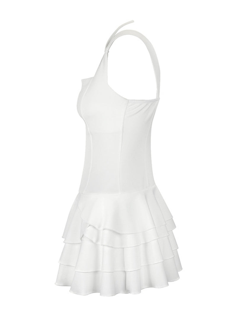 White dress with ruffled skirt on a white background