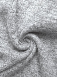 Close-up of gray fabric with a swirl pattern