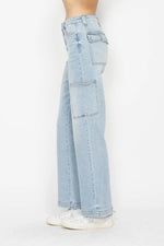 Light blue jeans worn by a person on a white background