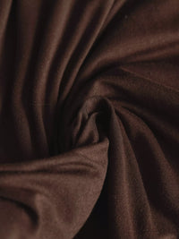 Close-up of brown fabric with folds
