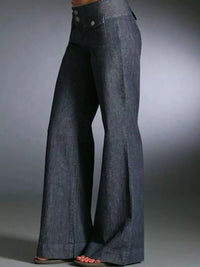 Blue denim bell-bottom pants on a gray background