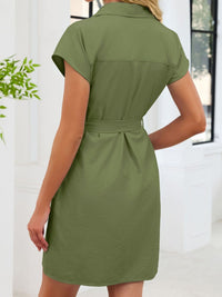 Green dress worn by a person with a white background