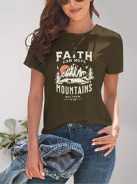 Woman wearing a green t-shirt with 'Faith can move mountains' design.