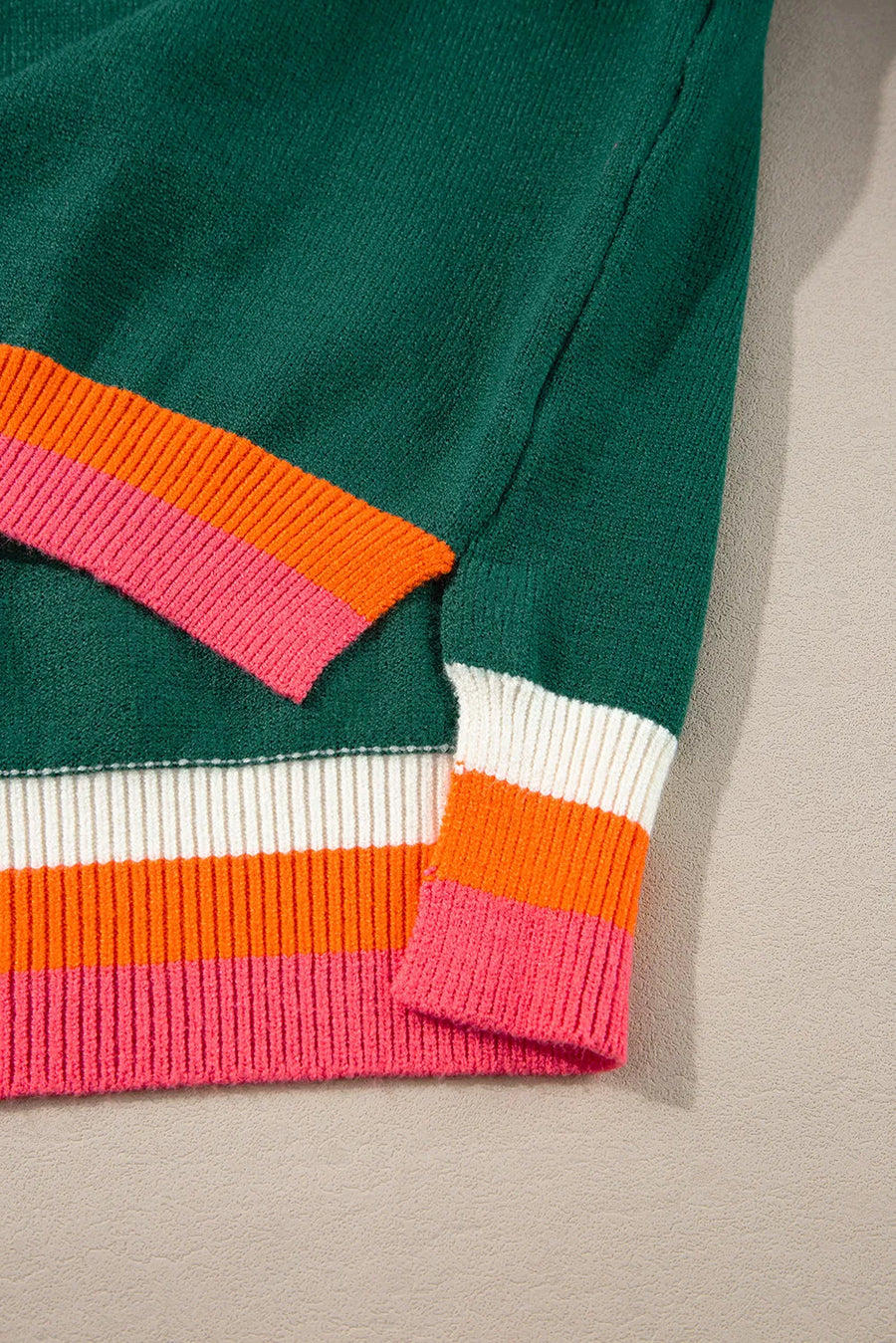 View of colors on sleeve and the hem of Contrast Round Neck Long Sleeve Sweater