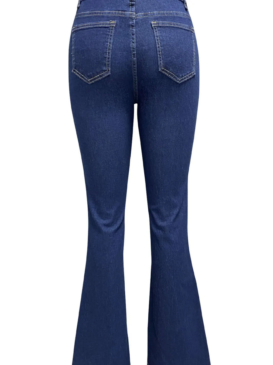 Blue jeans shown from the back on a white background
