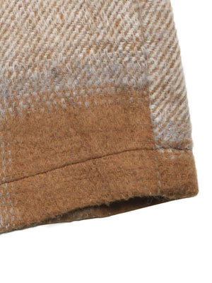 Close-up of a brown and beige checkered fabric texture