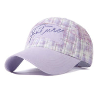 Purple plaid cap with 'Justine' embroidery on a white background