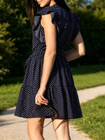 Side view of black Polka Dot Ruffle Sleeve Tie Waist Dress 