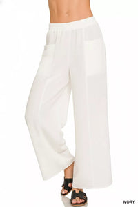 White wide-leg pants on a white background