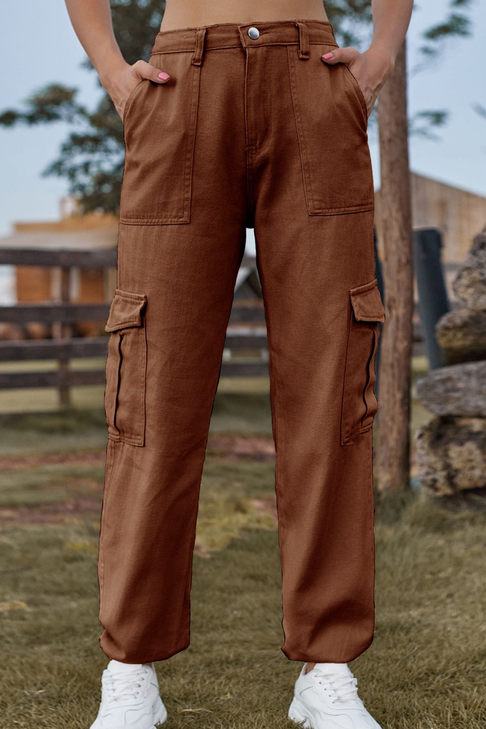 Brown cargo pants worn by a person outdoors with a blurred background
