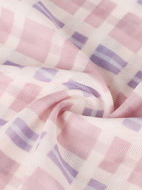Close-up of pink and purple checkered fabric