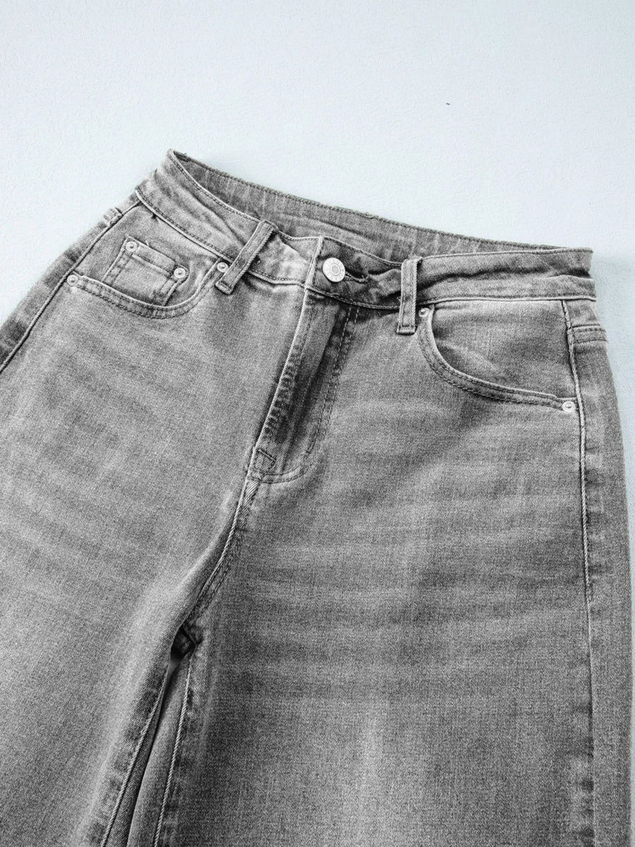 Gray jeans on a light gray background