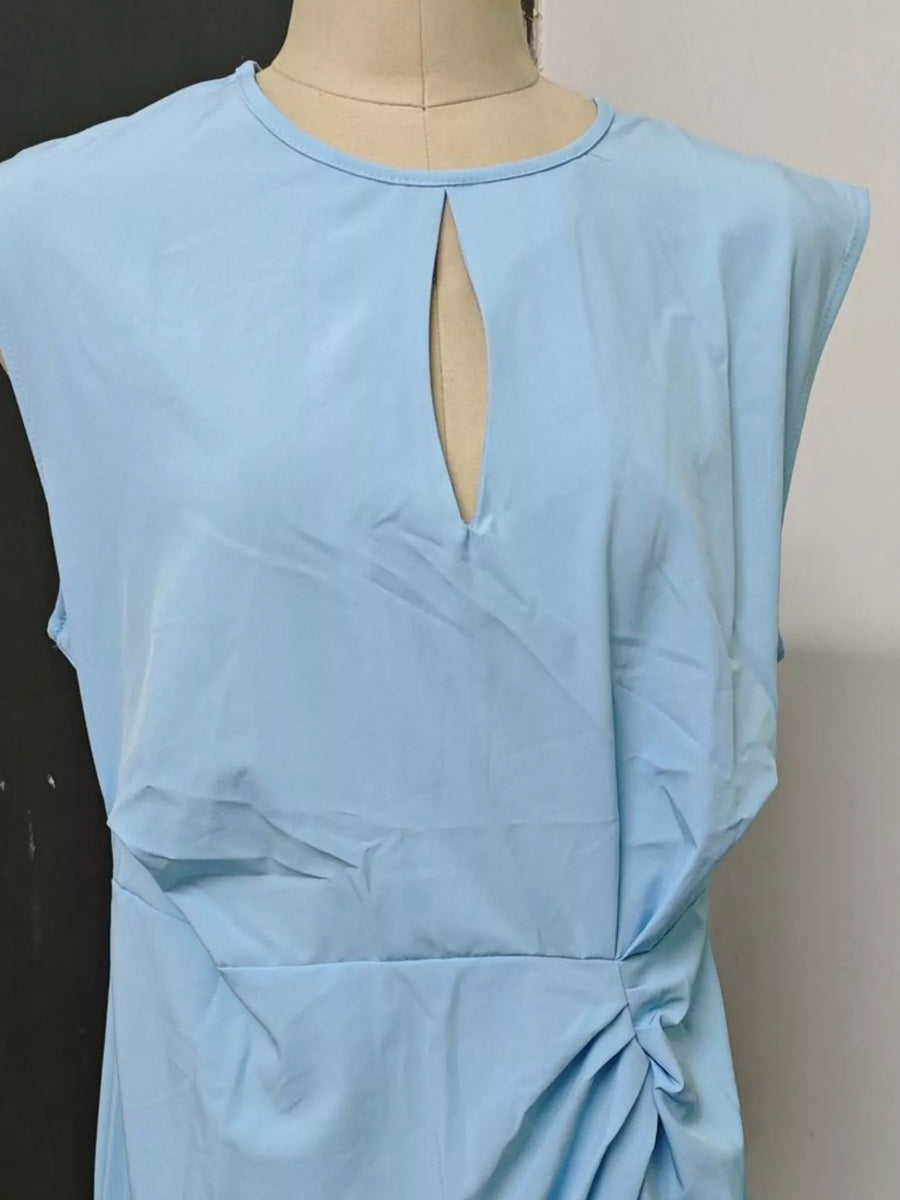 Light blue dress on a mannequin against a plain background
