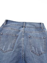 Back view of blue jeans on a white background