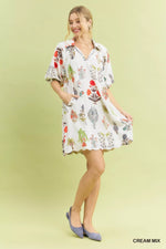 Woman wearing a floral dress on a light green background