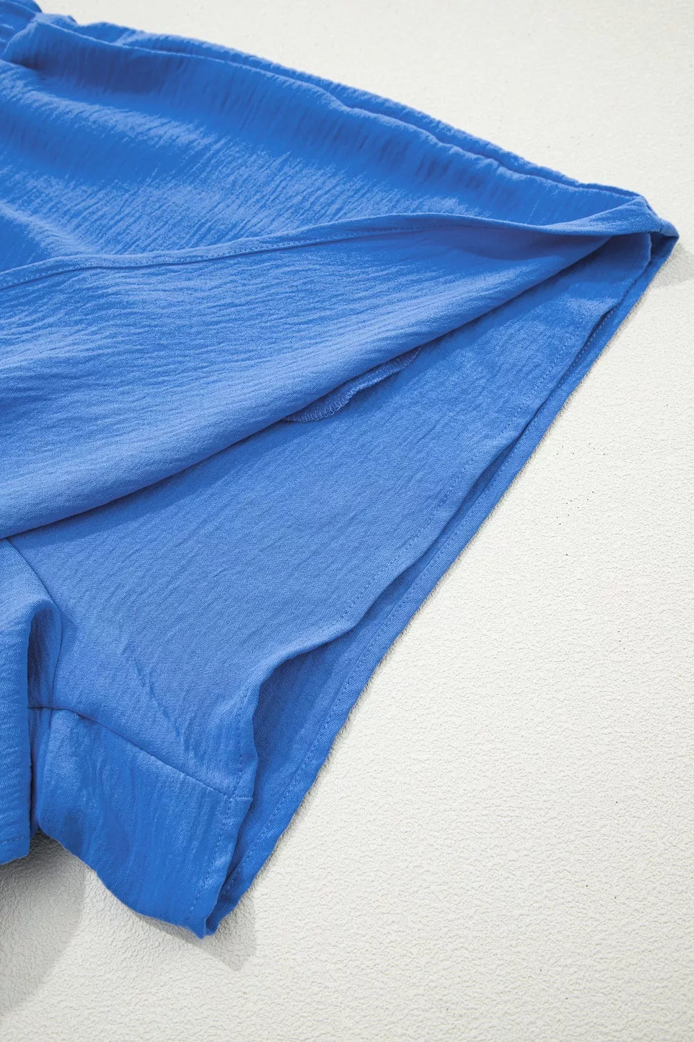 Blue fabric on a white background