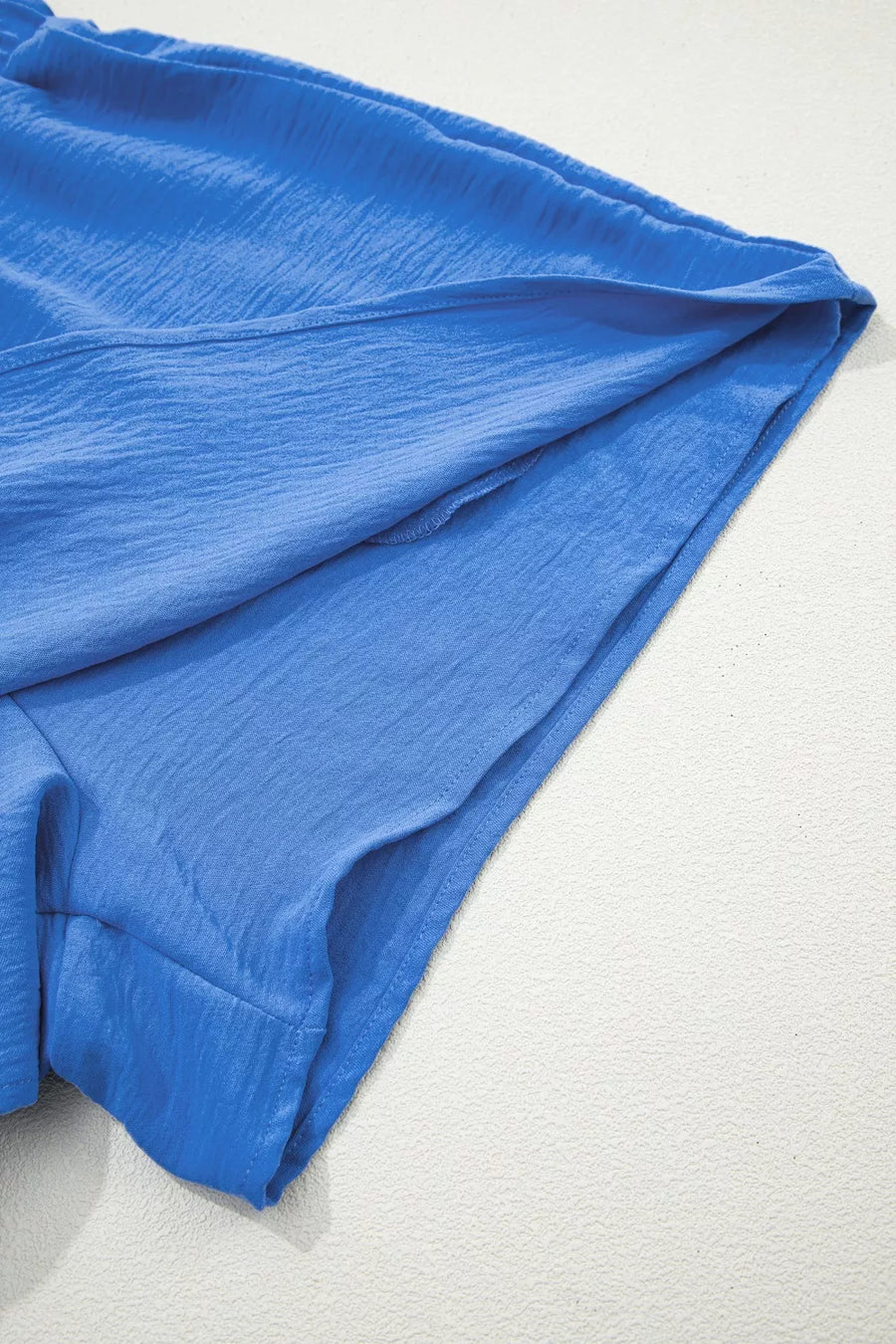 Blue fabric on a white background