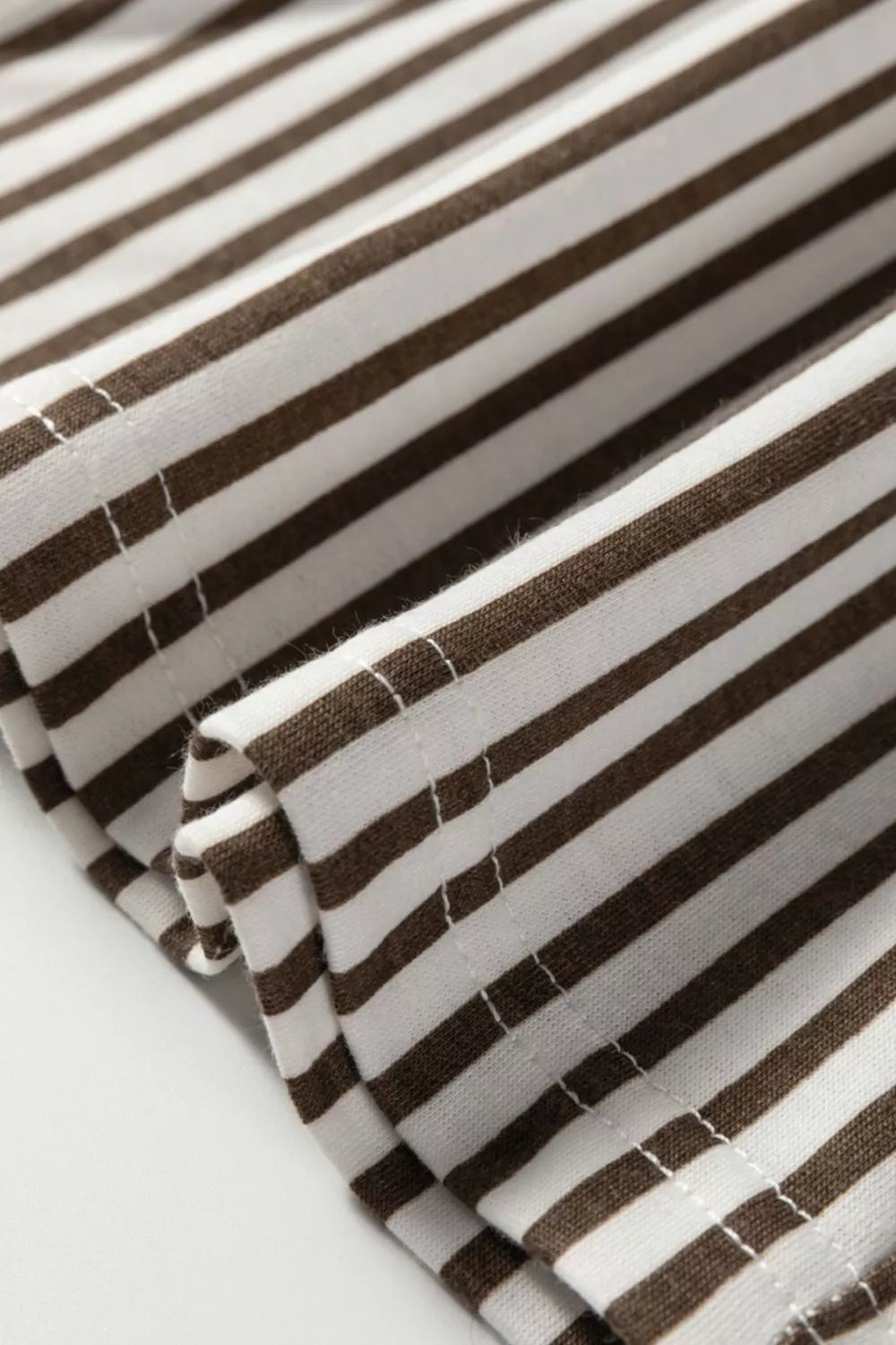 Close-up of brown and white striped fabric