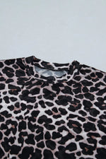 Leopard print fabric on a light blue background