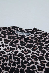 Leopard print fabric on a light blue background
