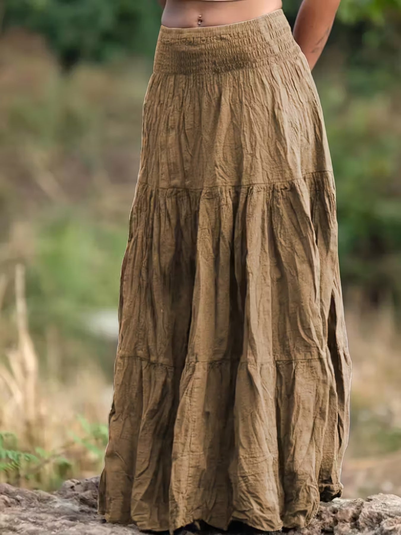 Long, tiered skirt in a natural setting