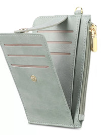 Light gray wallet with gold zipper and clasp on a white background