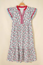 Floral dress with red accents on a beige background