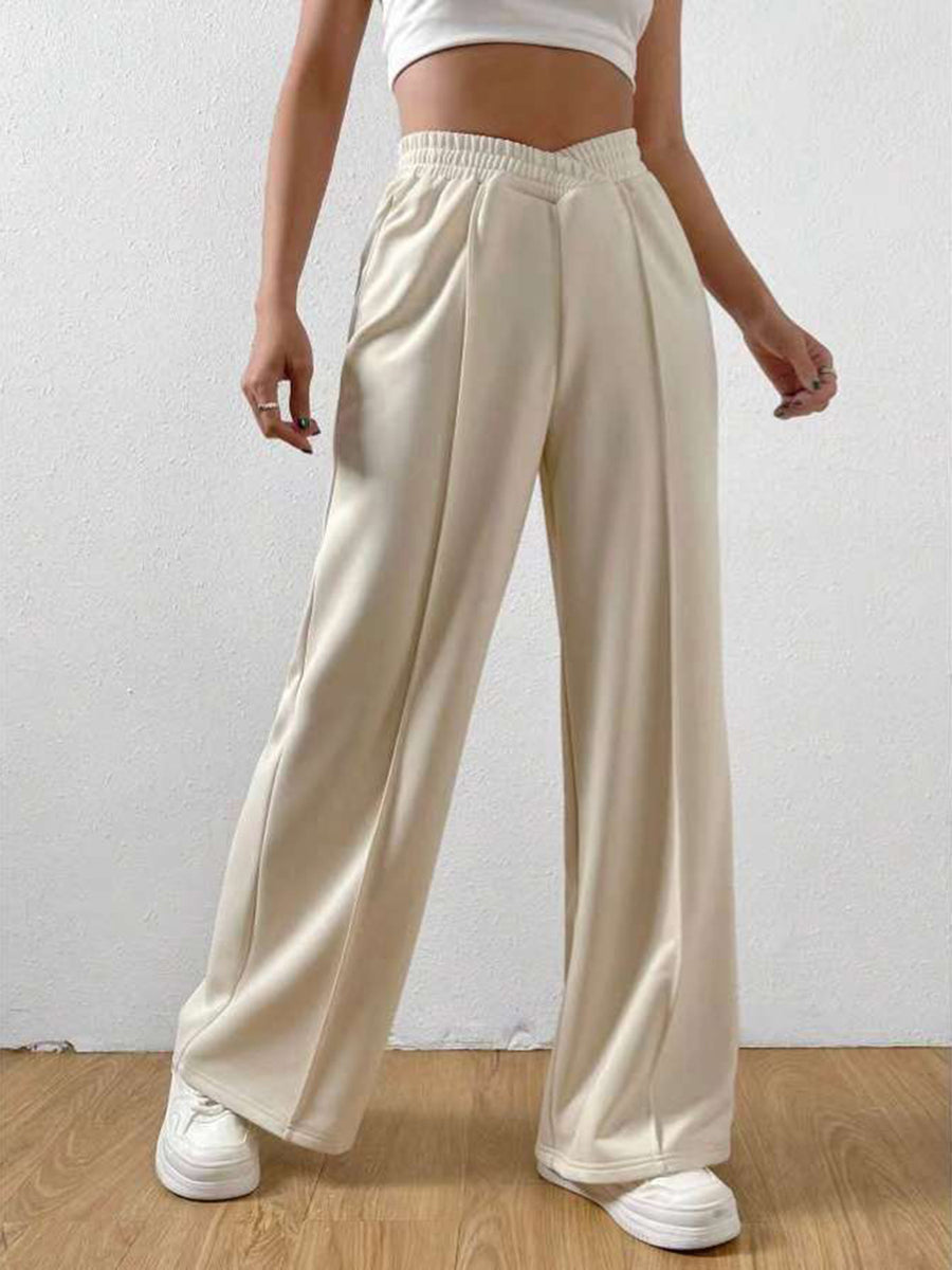 Lady showing front of white Elastic Waist Wide Leg Jogger Pants