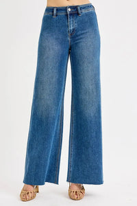 Blue wide-leg jeans on a white background
