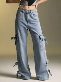 Light blue denim cargo pants worn by a person on a neutral background