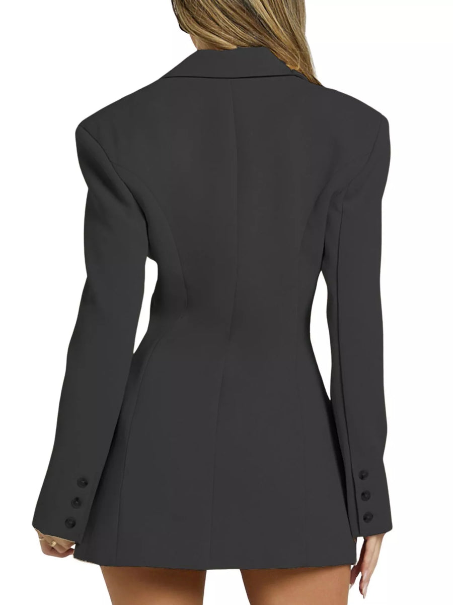 Black blazer worn by a person on a white background