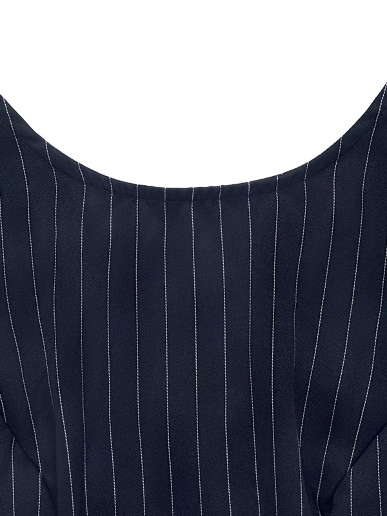 Close-up of a navy blue pinstripe suit jacket on a white background