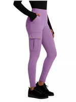 Purple leggings worn by a person on a white background
