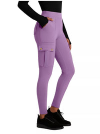 Purple leggings worn by a person on a white background
