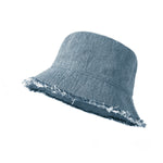 Blue denim bucket hat with white floral embroidery on a white background