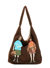Brown textured handbag with appliqué figures on a white background