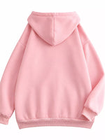A light pink pullover hoodie shown from the back, featuring a simple stitched seam down the center back, ribbed cuffs, and a ribbed hem, set against a plain white background.