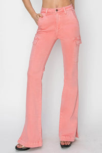 Pink flared jeans on a white background