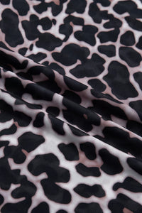 Close-up of fabric with black and white abstract pattern