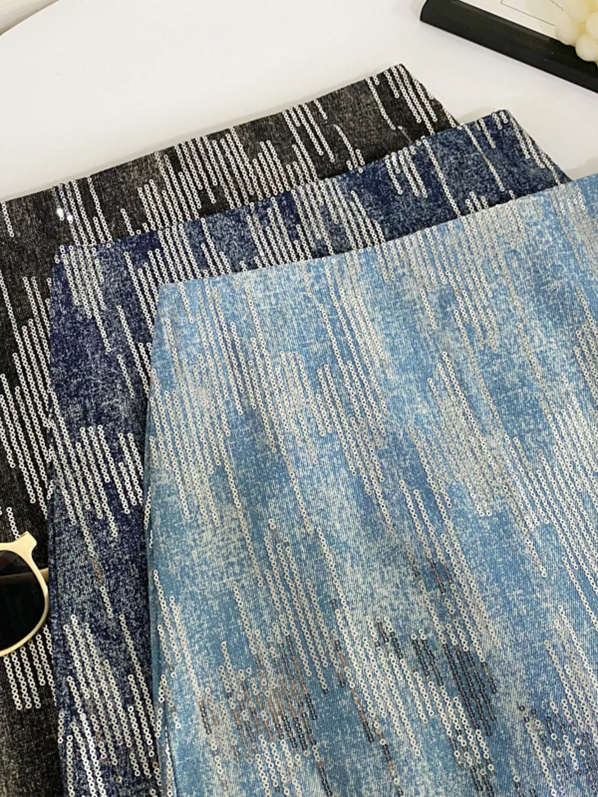 Three textured fabric samples in black, blue, and gray on a white background.