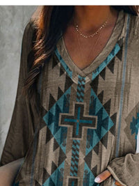 Person wearing a patterned shirt with geometric design