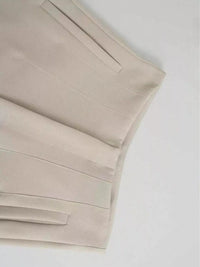 Beige bed sheets on a white background