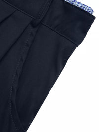 Close-up of a dark blue suit jacket with a white background