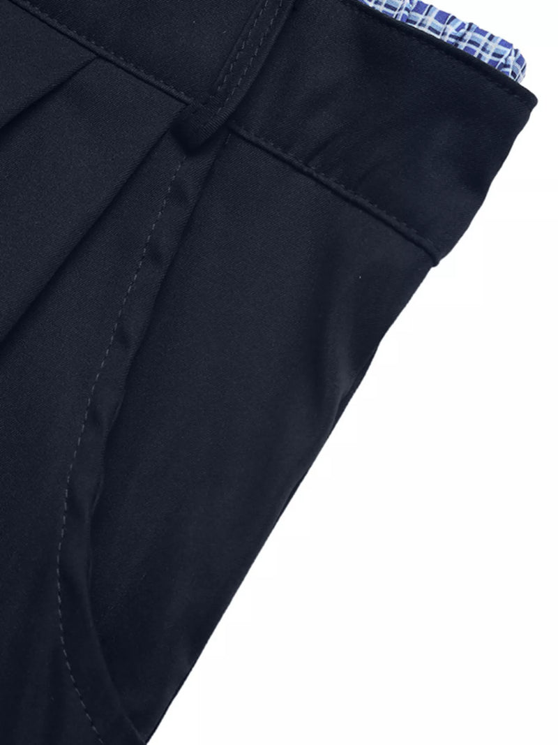 Close-up of a dark blue suit jacket with a white background