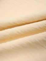 Close-up of beige fabric texture