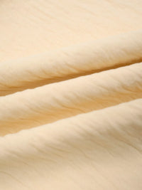 Close-up of beige fabric texture