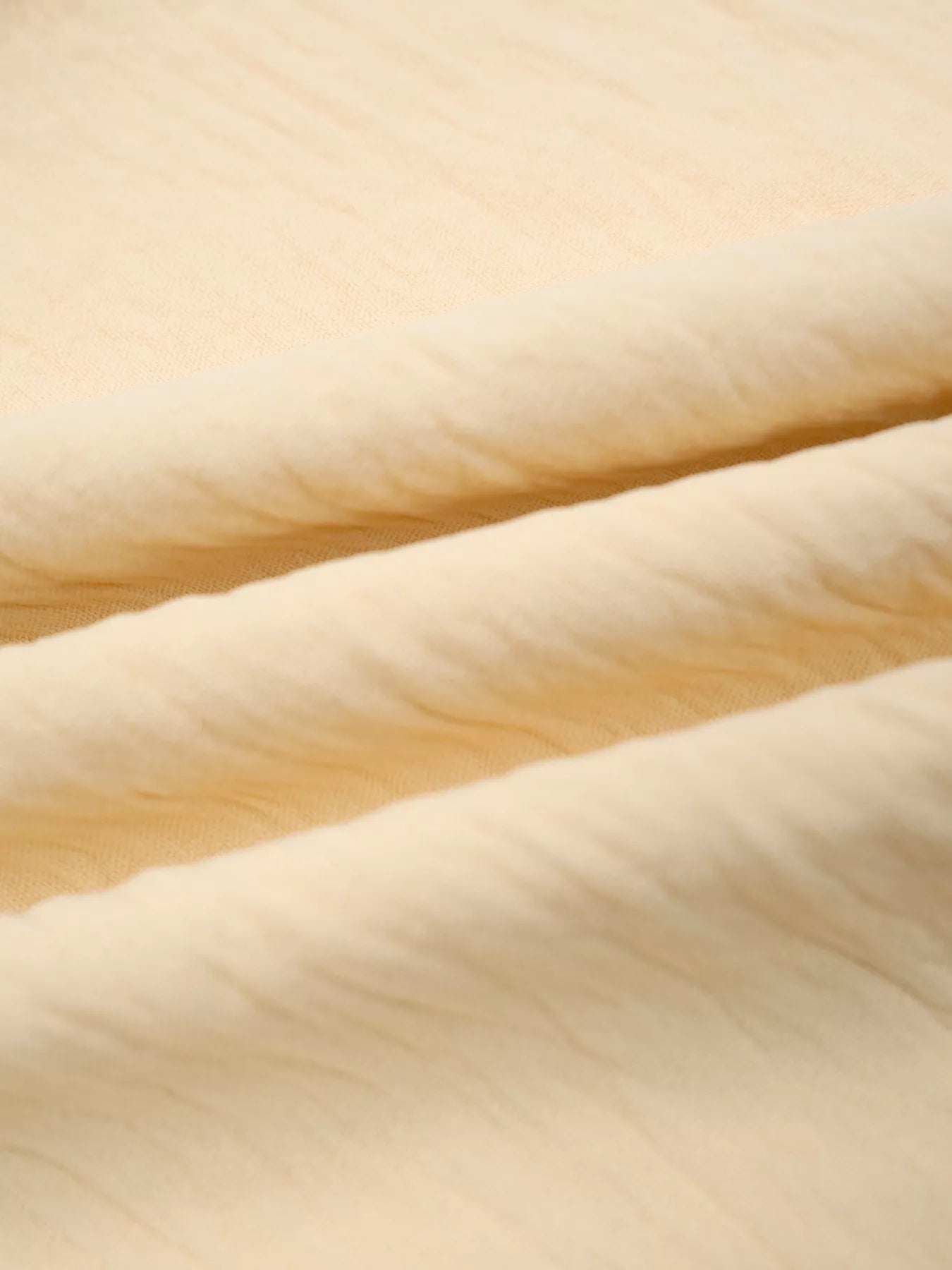Close-up of beige fabric texture