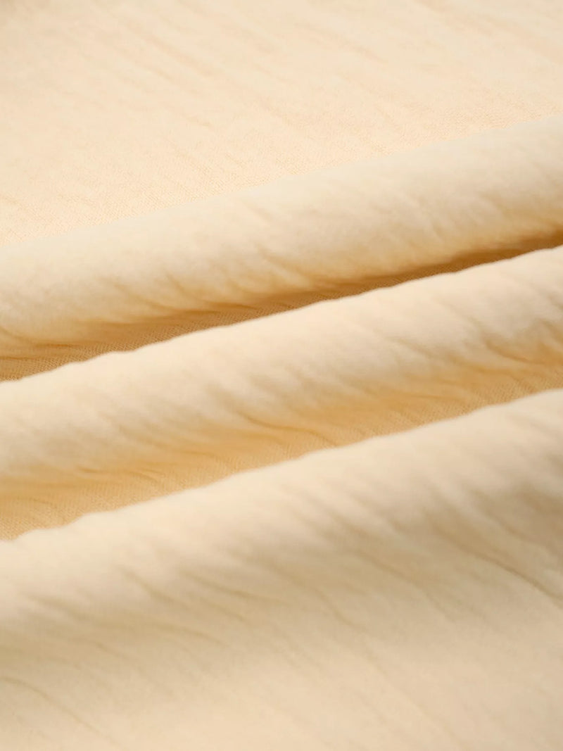 Close-up of beige fabric texture