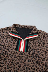 Leopard print jacket with a colorful zipper on a light gray background
