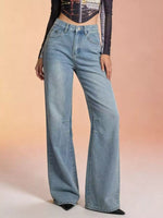 Light blue jeans worn by a person on a gradient background